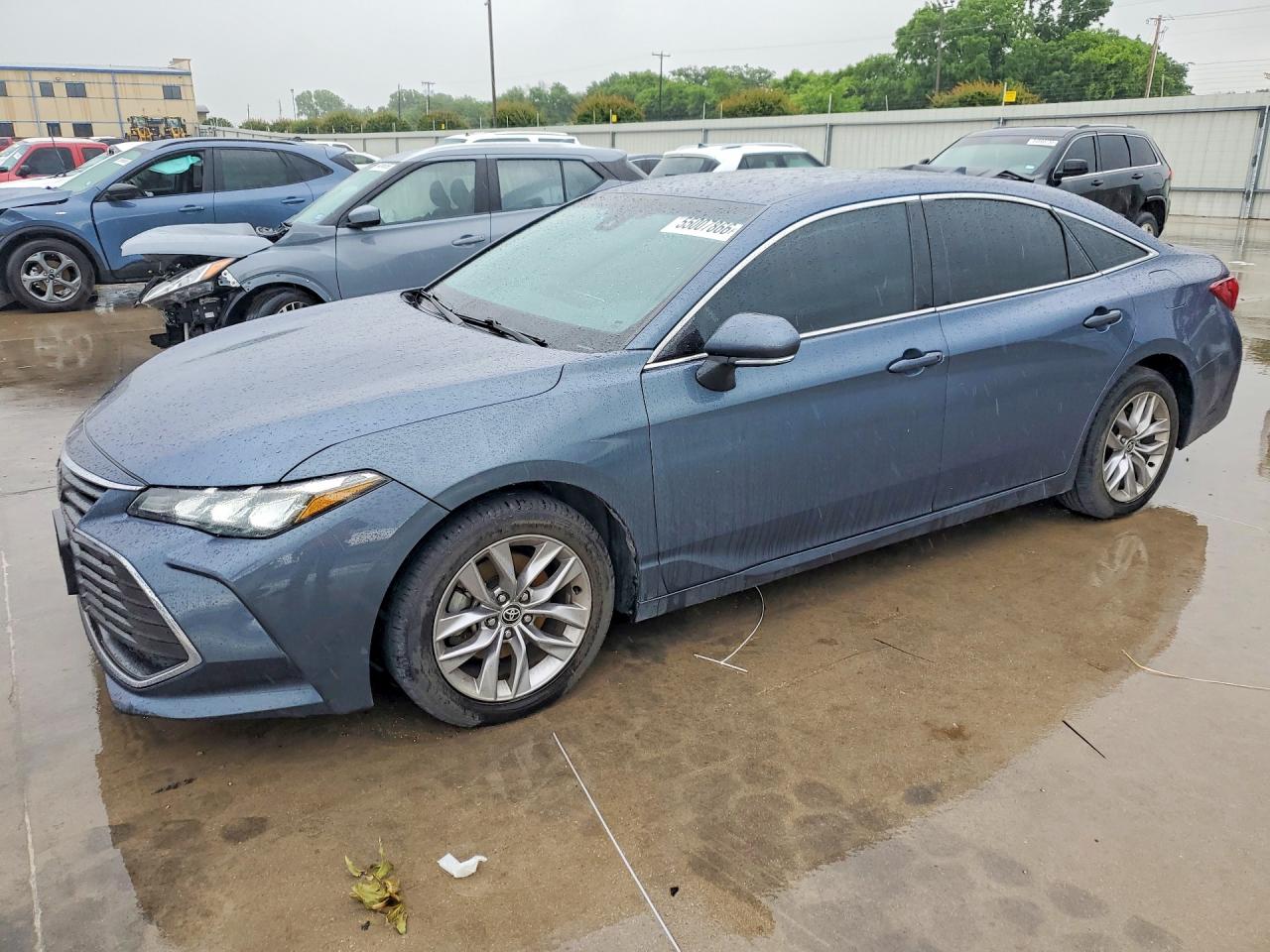 2022 Toyota Avalon XLE, VIN 4T1JZ1FB2NU087095 — Side
