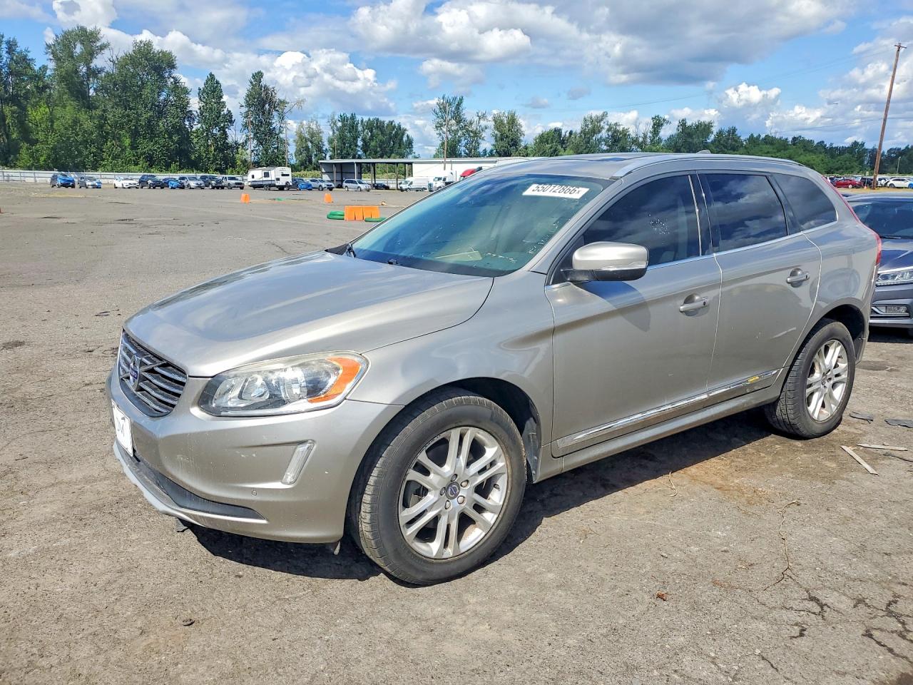 2016 Volvo XC60 T5 Drive-E Premier, VIN YV440MDK0G2823446 — Бок