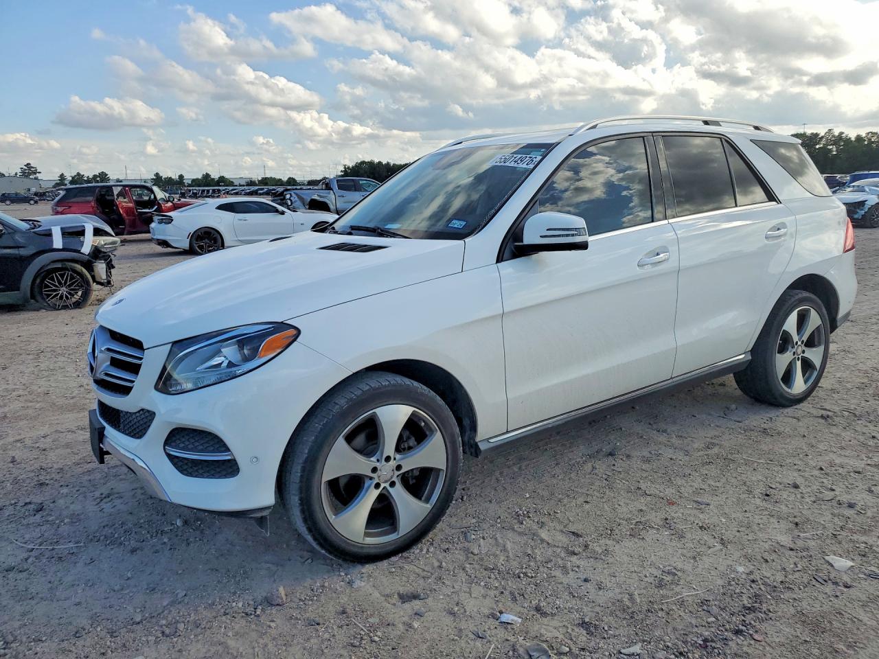 2016 Mercedes-Benz GLE 350, VIN 4JGDA5JB0GA785504 — Side