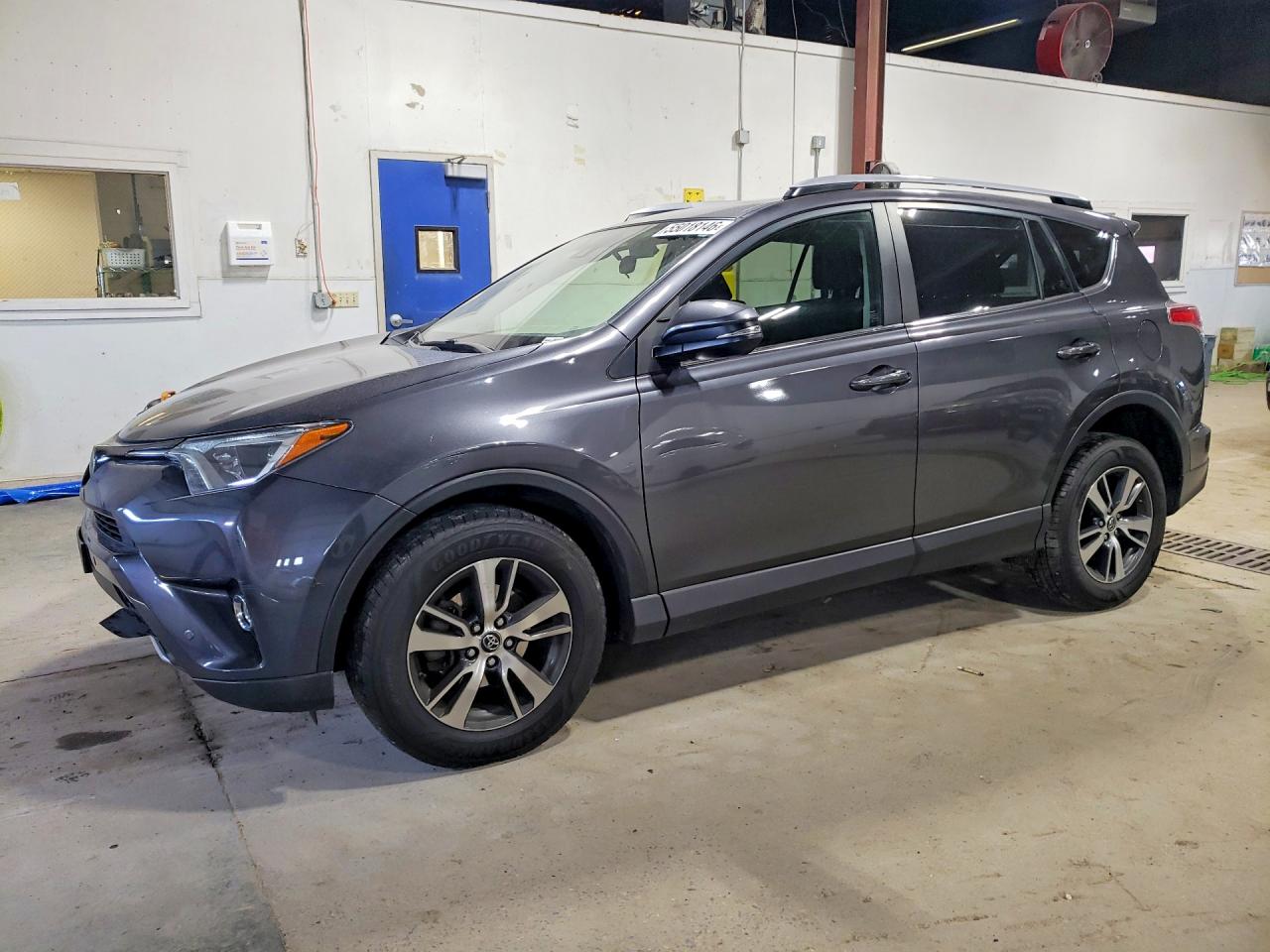 2018 Toyota RAV4 XLE, VIN JTMRFREV2JJ248888 — Front end
