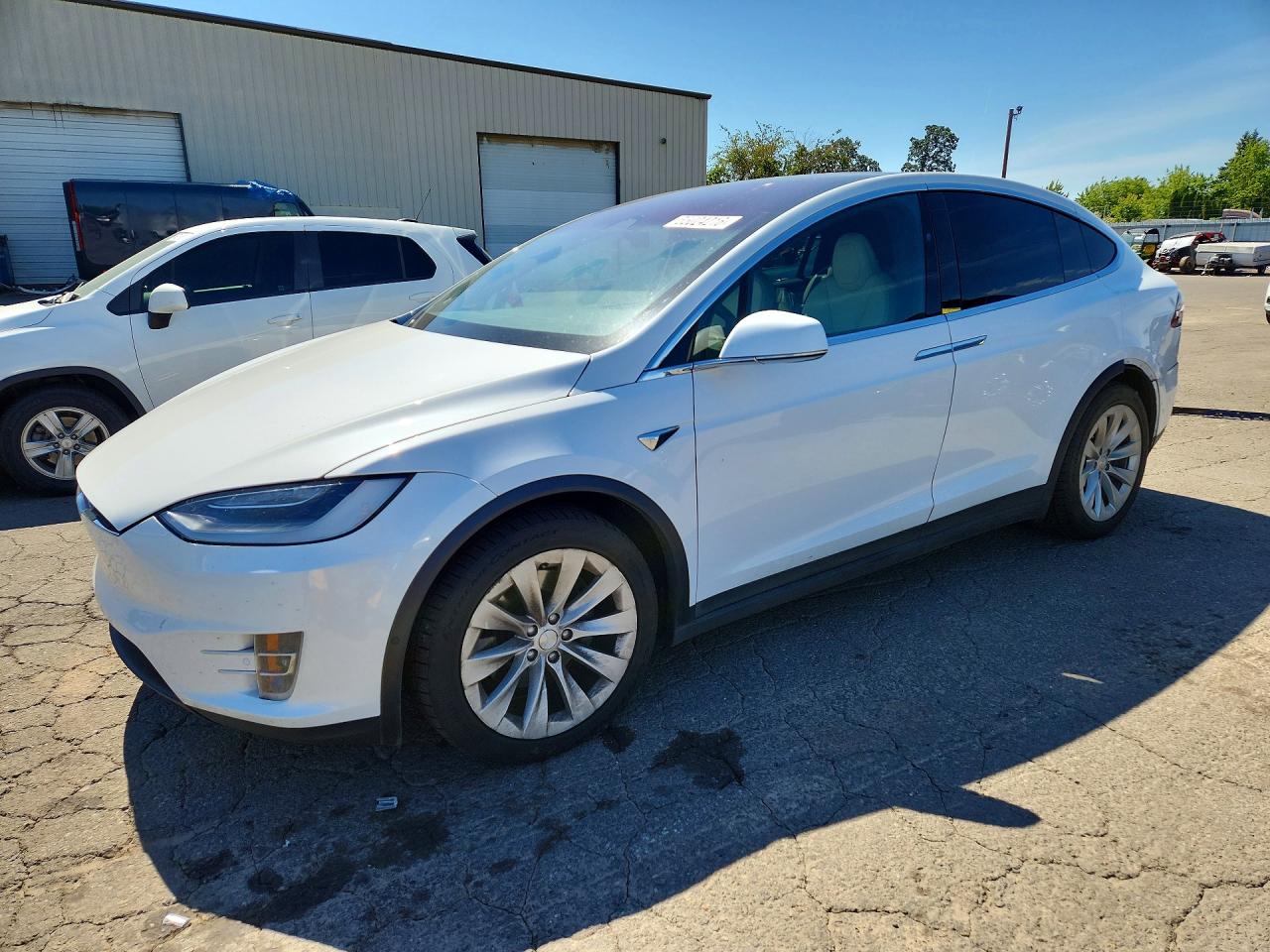 2021 Tesla Model X Long Range Plus, VIN 5YJXCBE2XMF321630 — Rear end