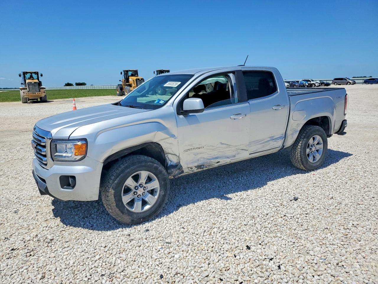 2015 GMC Canyon 4WD SLE, VIN 1GTG6BE32F1143207 — Side