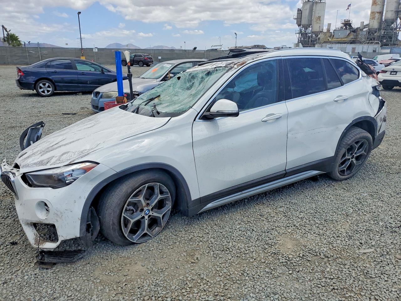 2019 BMW X1 sDrive28i, VIN WBXHU7C59K5L11202 — Rollover