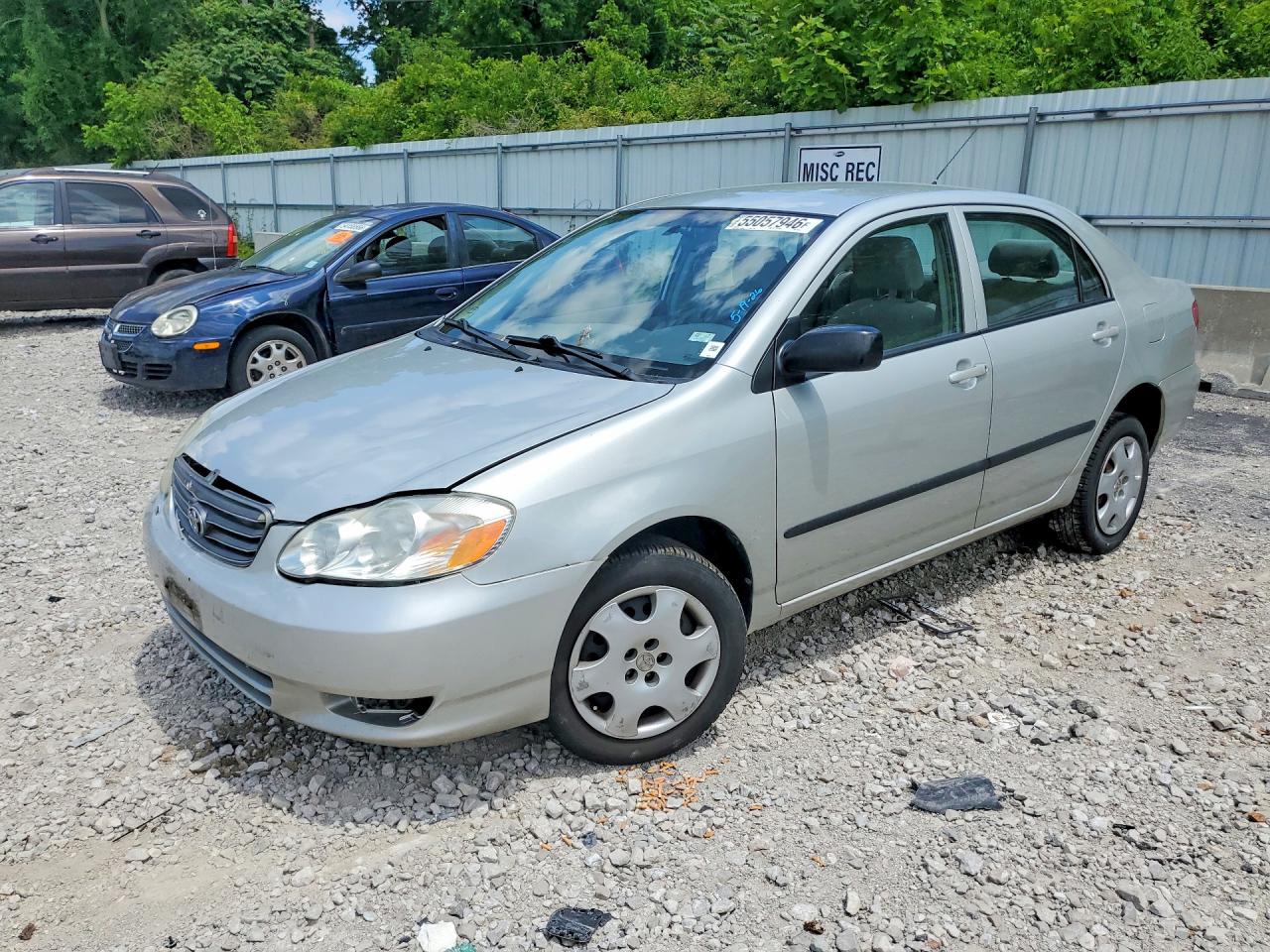 2003 Toyota Corolla CE, VIN 1NXBR32E23Z015911 — Side