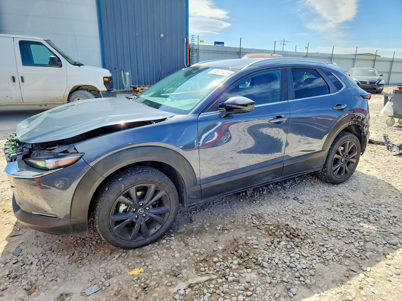 2022 Mazda CX-30 S Carbon Edition, VIN 3MVDMBCL2NM457676 — Rear end