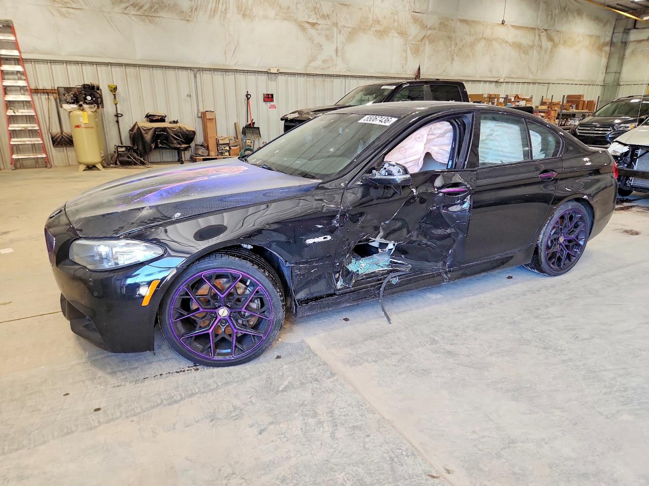 2014 BMW 5 Series 550i xDrive, VIN WBAKP9C59ED692255 — Side