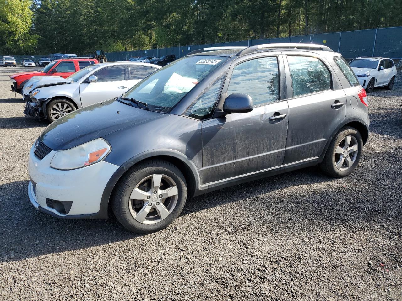 2010 Suzuki SX4 Touring, VIN JS2YB5A77A6310365 — Undercarriage