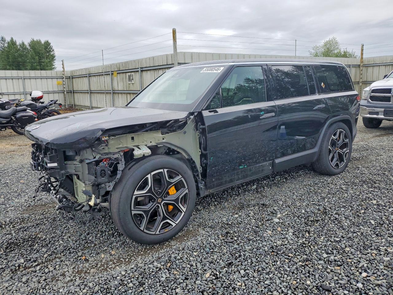 2023 Rivian R1S Adventure, VIN 7PDSGABA0PN028709 — Front end