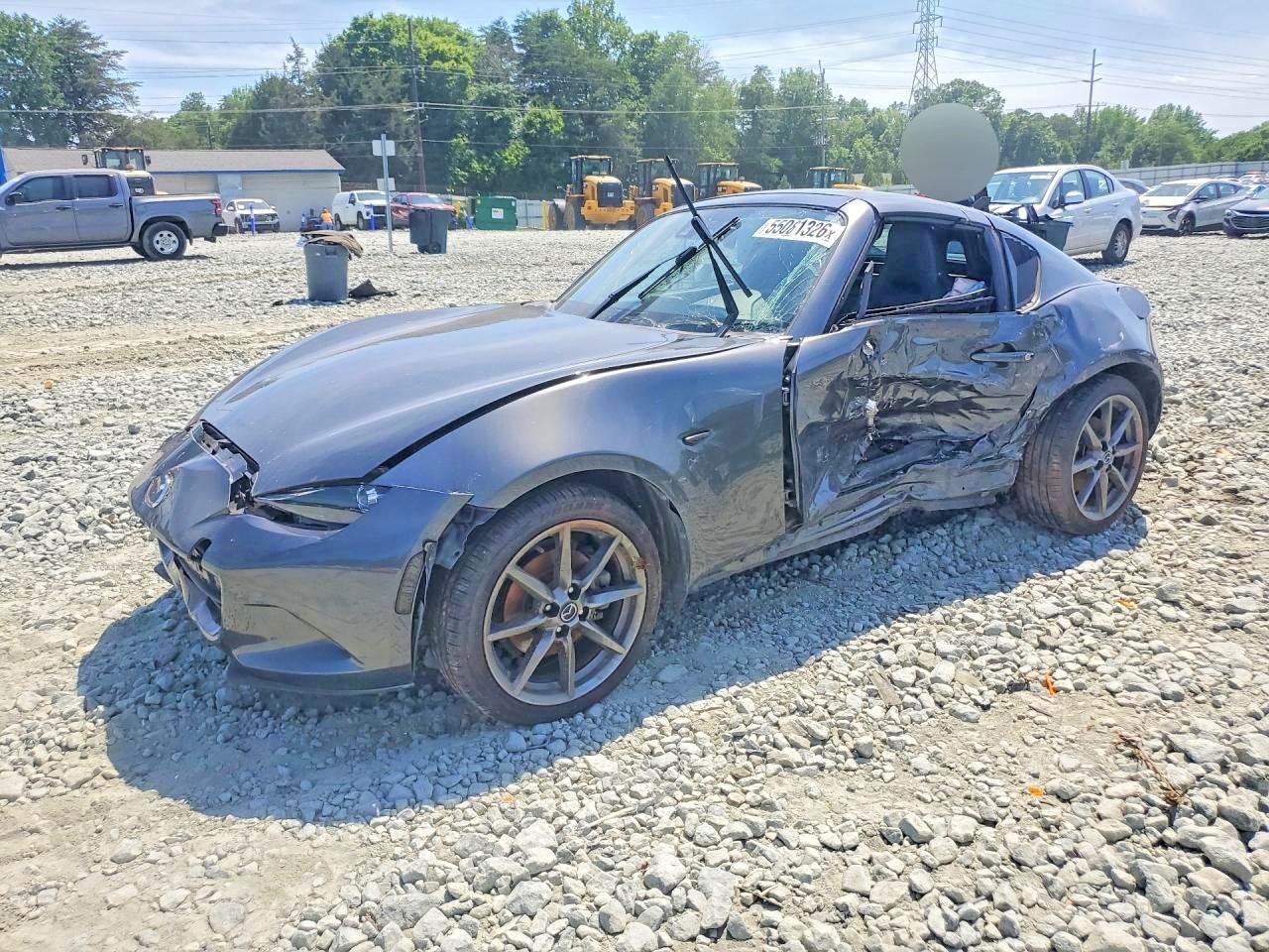 2017 Mazda MX-5 Miata Grand Touring, VIN JM1NDAM75H0104082 — Бок