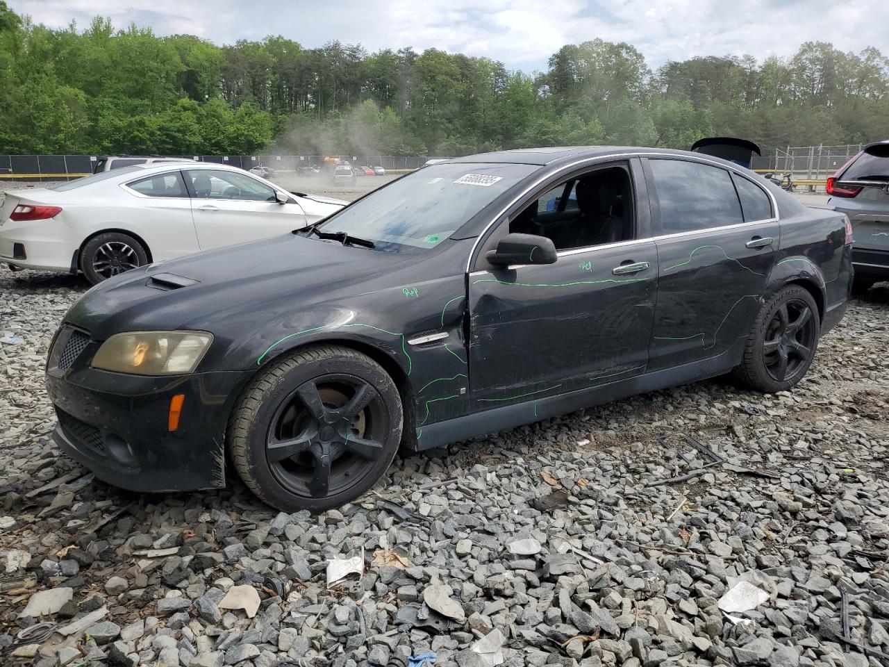 2009 Pontiac G8 GT, VIN 6G2EC57YX9L207780 — Side