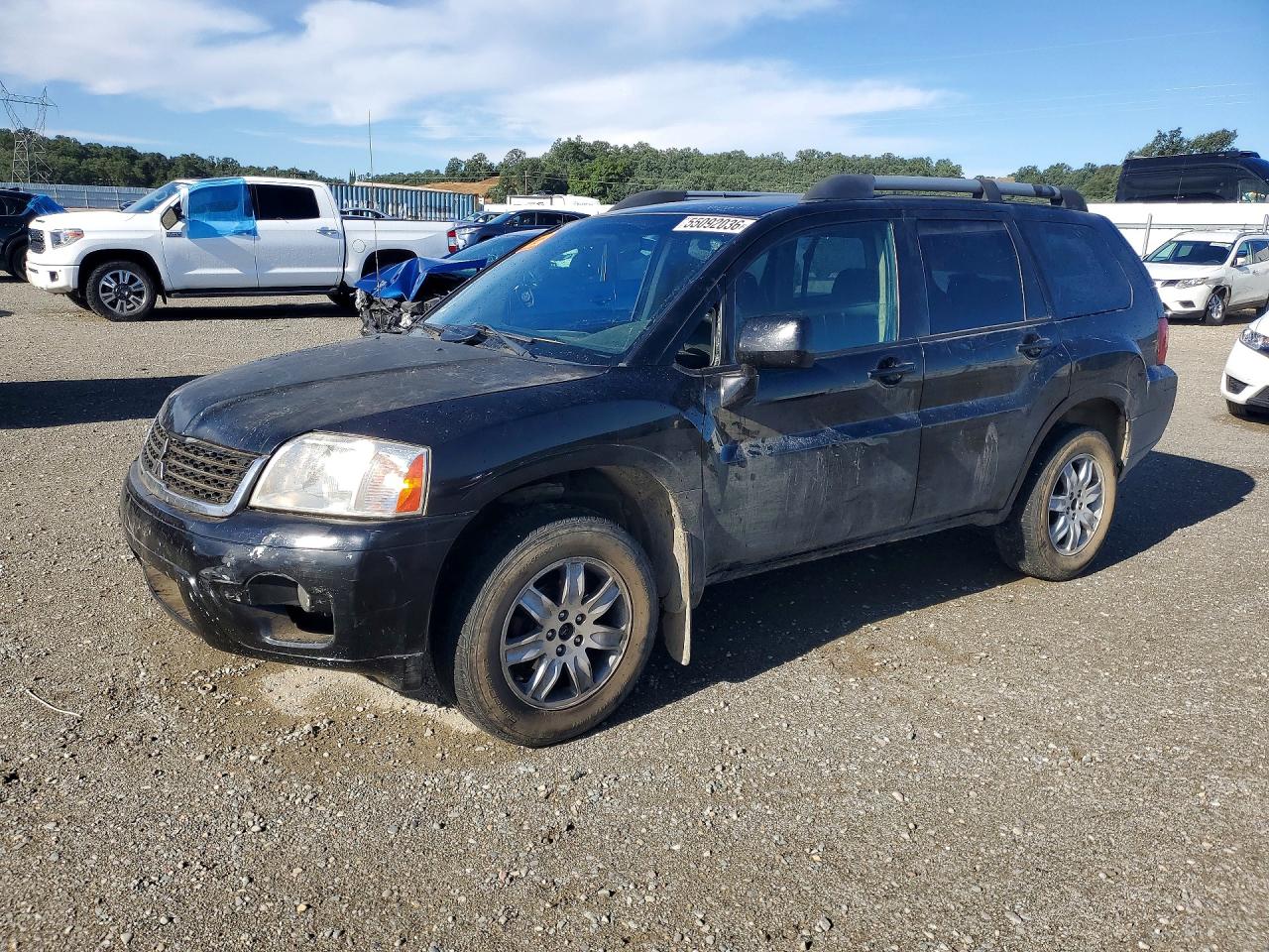 2011 Mitsubishi Endeavor LS, VIN 4A4JN2AS9BE029951 — Side