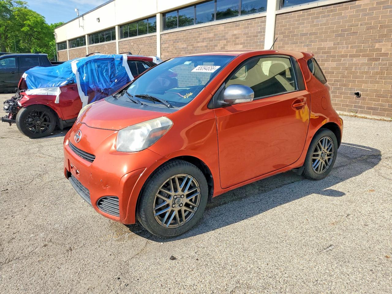 2012 Scion iQ, VIN JTNJJXB09CJ011371 — Minor dents and scratches
