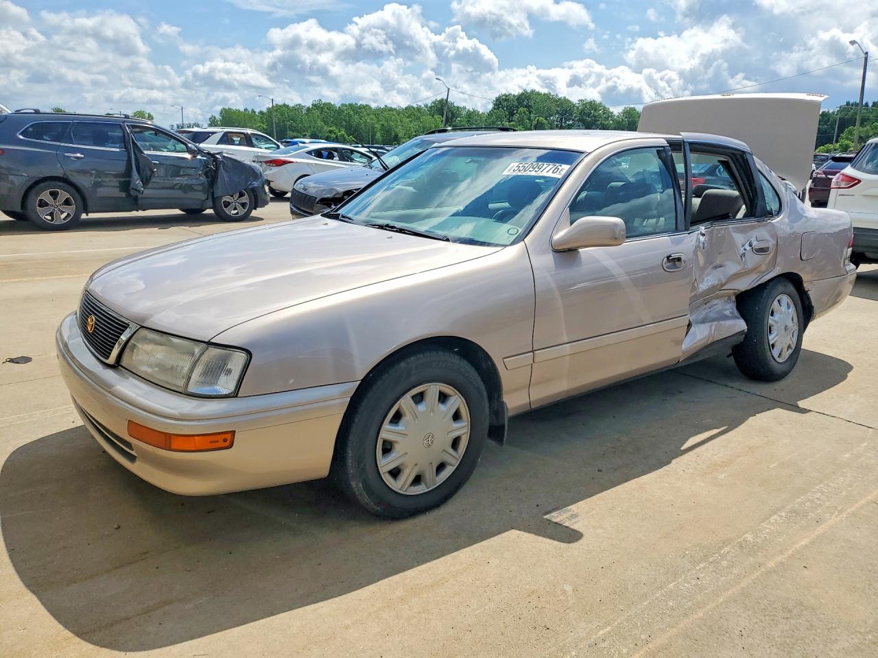 1997 Toyota Avalon XL, VIN 4T1BF12B3VU182428 — Side