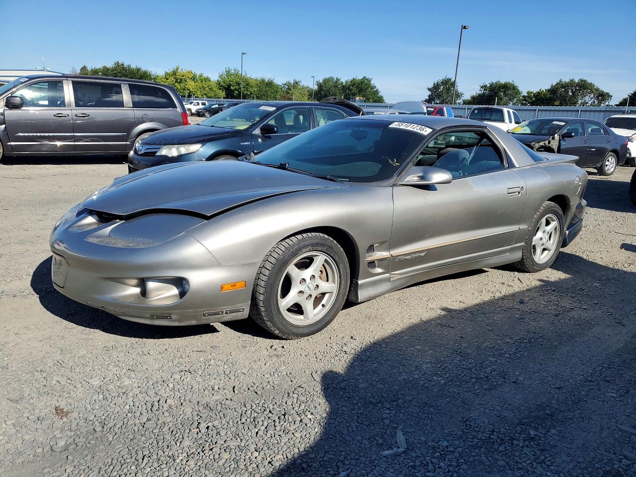 1999 Pontiac Firebird Firebird, VIN 2G2FS22K5X2204627 — Side
