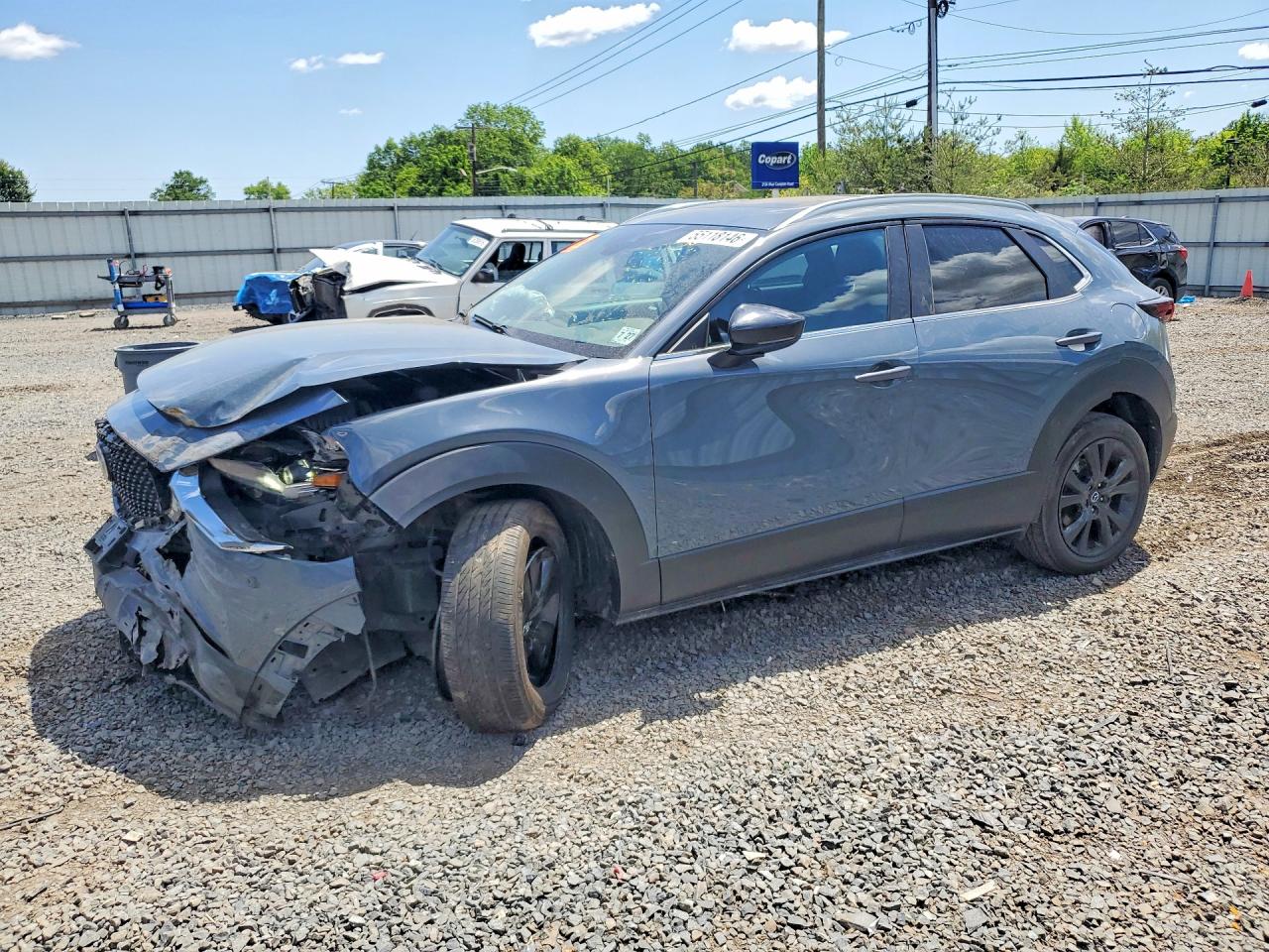 2022 Mazda CX-30 S Carbon Edition, VIN 3MVDMBCL8NM430031 — Перед