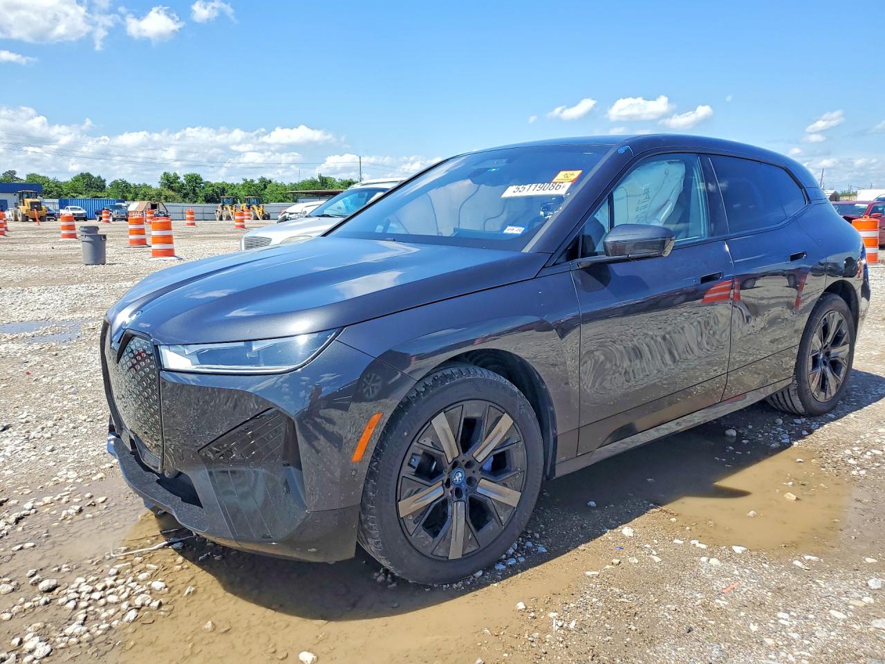 2025 BMW iX xDrive50, VIN WB523CF05SCT45837 — Side