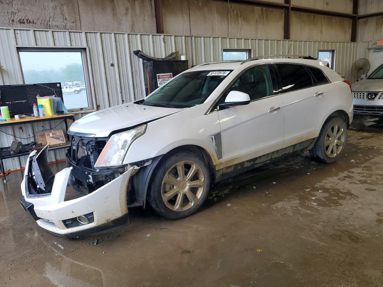 2015 Cadillac SRX Performance Collection, VIN 3GYFNCE39FS586659 — Front end
