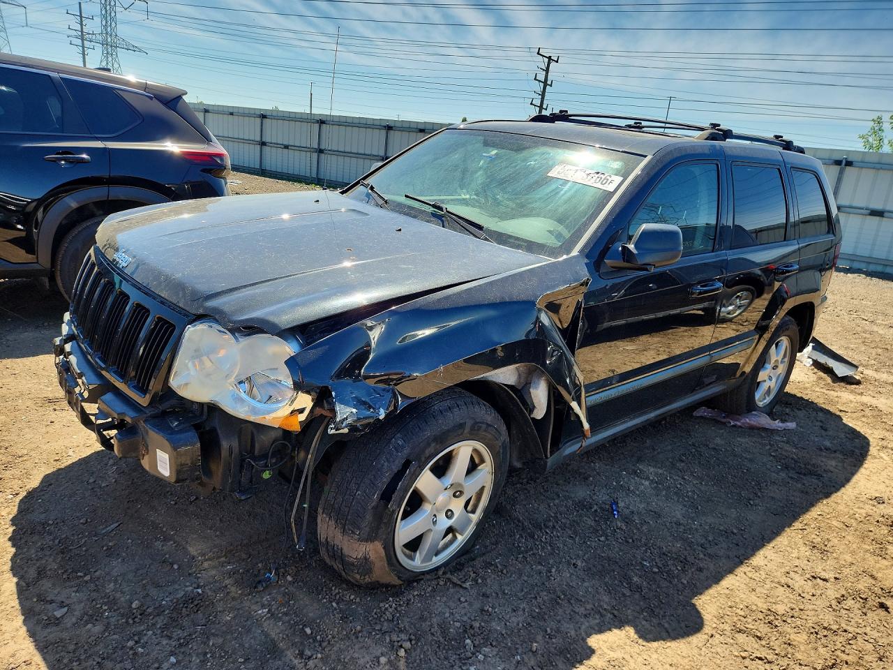 2008 Jeep Grand Cherokee Laredo, VIN 1J8GR48KX8C218984 — Front end