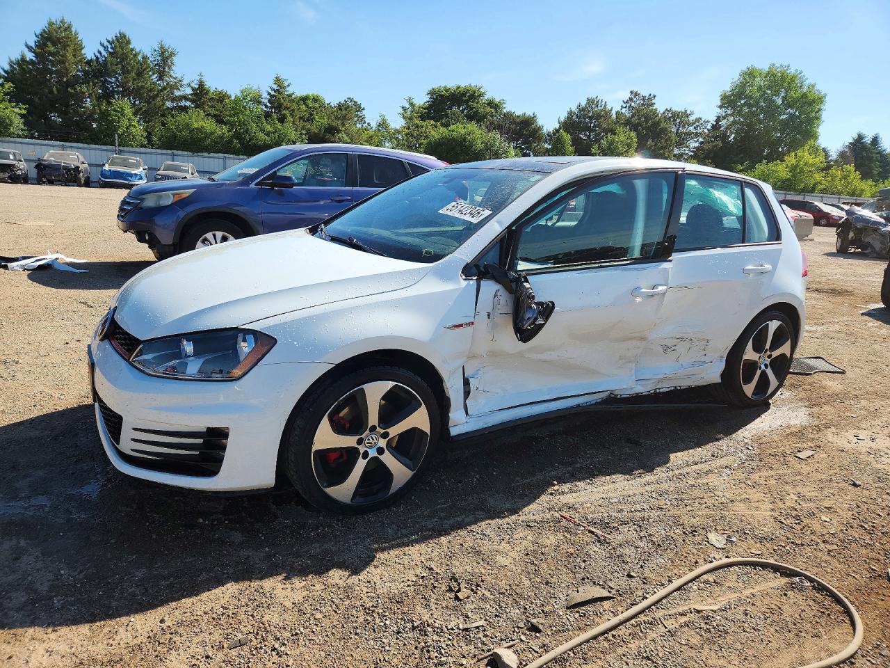 2016 Volkswagen Golf GTI S, VIN 3VW4T7AU1GM015856 — Side