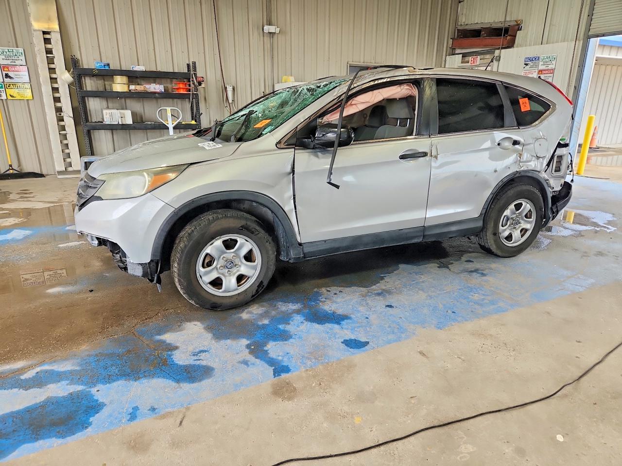 2013 Honda CR-V LX, VIN 3CZRM3H32DG703025 — Rollover