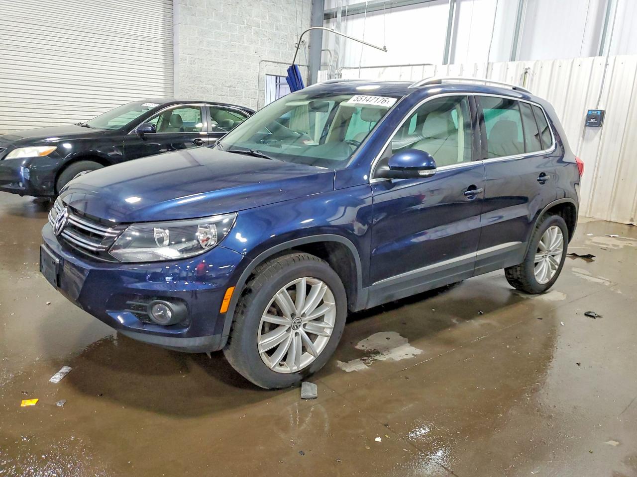 2015 Volkswagen Tiguan SEL, VIN WVGBV7AX3FW553533 — Vandalism