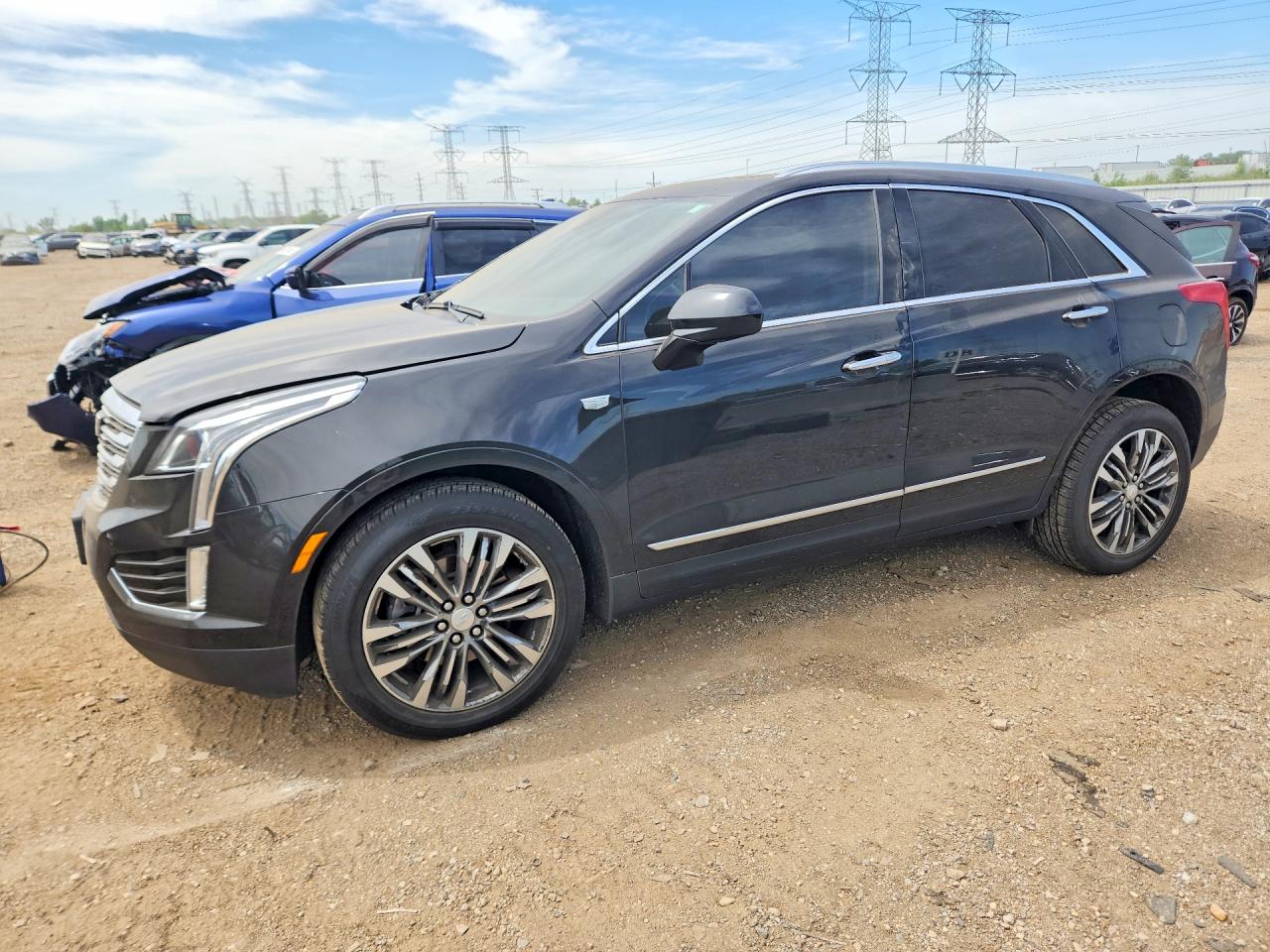 2019 Cadillac XT5 Luxury AWD, VIN 1GYKNDRS4KZ274834 — Hail