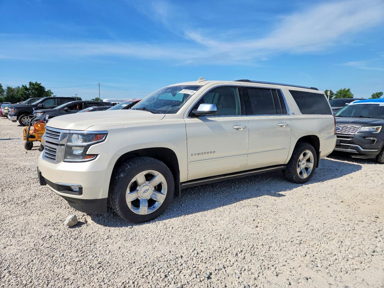 2015 Chevrolet Suburban LTZ, VIN 1GNSKKKCXFR621005 — Hail