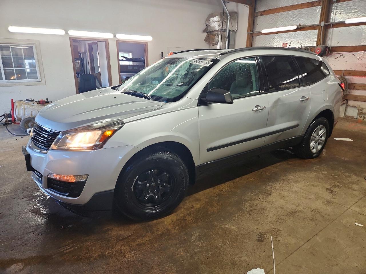2017 Chevrolet Traverse LS, VIN 1GNKRFKD7HJ312654 — Side