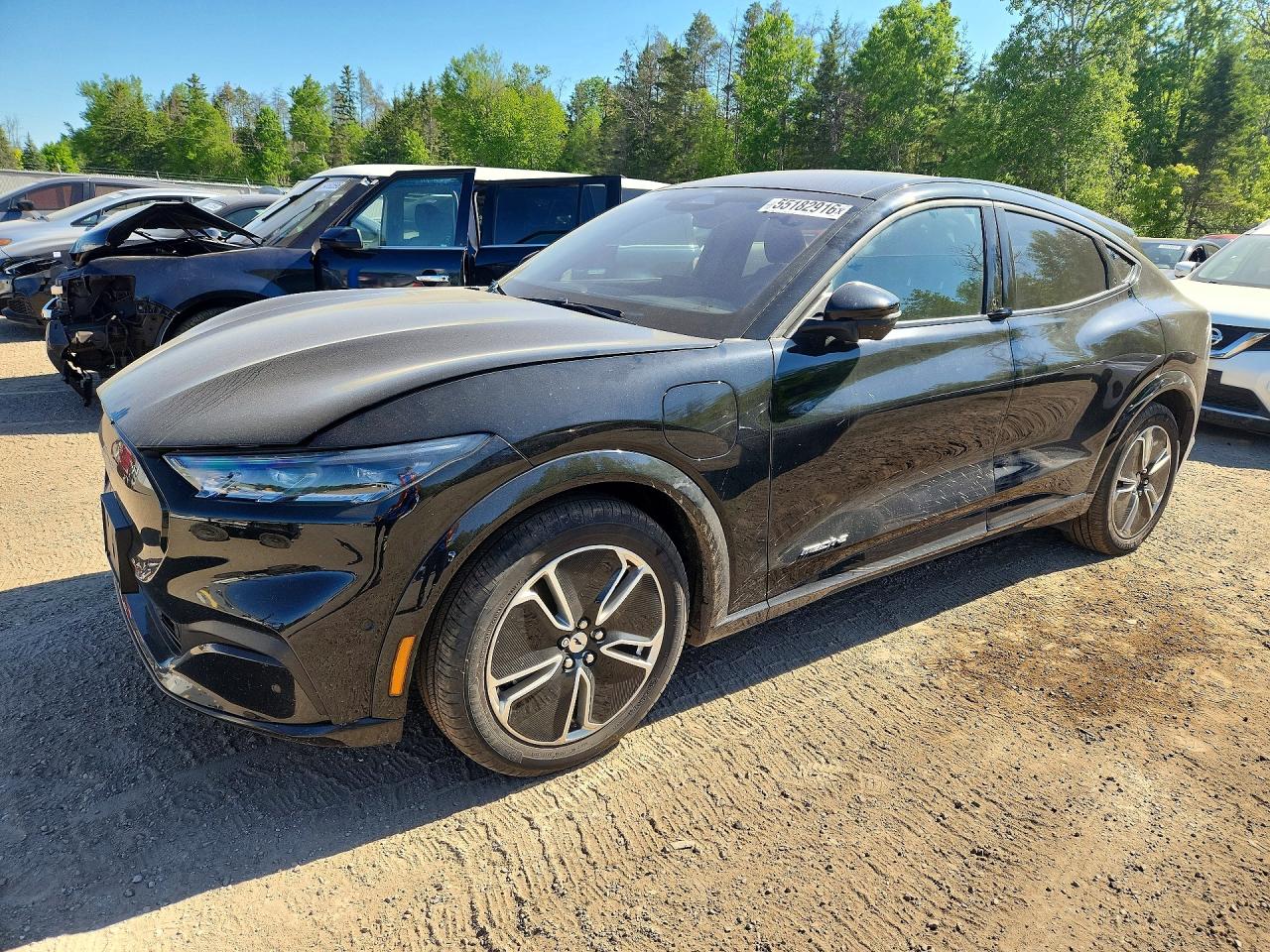 2023 Ford Mustang Mach-E Premium, VIN 3FMTK3R45PMB01066 — Side