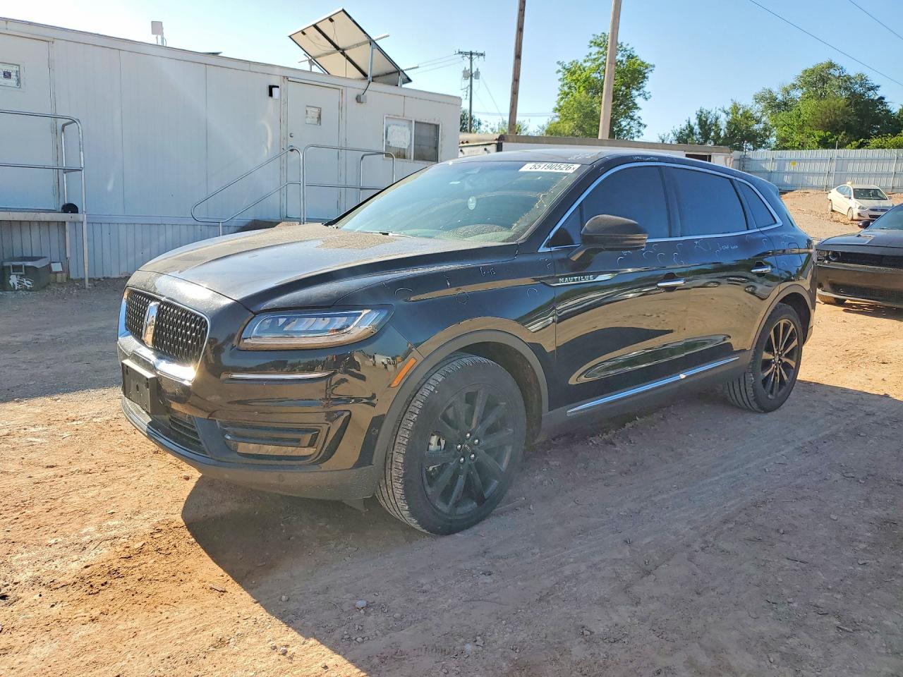 2020 Lincoln Nautilus Reserve, VIN 2LMPJ6K9XLBL23100 — Hail