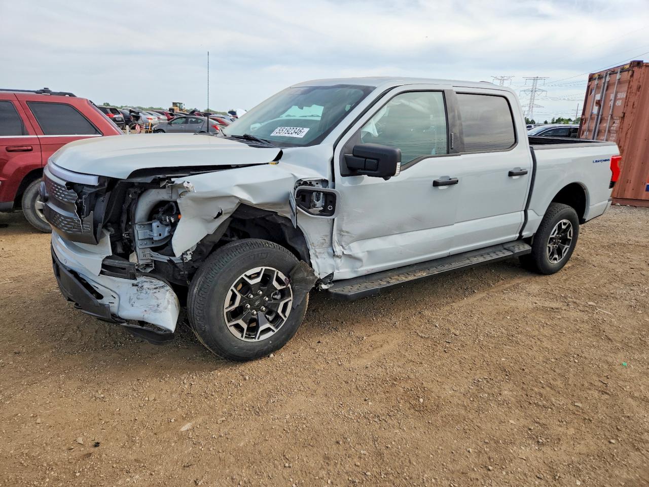 2023 Ford F-150 Lightning XLT, VIN 1FTVW1EL4PWG39910 — Front end