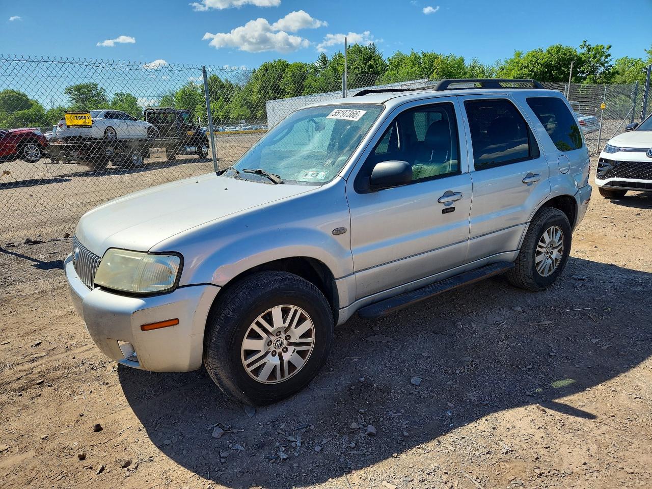 2005 Mercury Mariner Luxury, VIN 4M2YU57115DJ15199 — Rear end