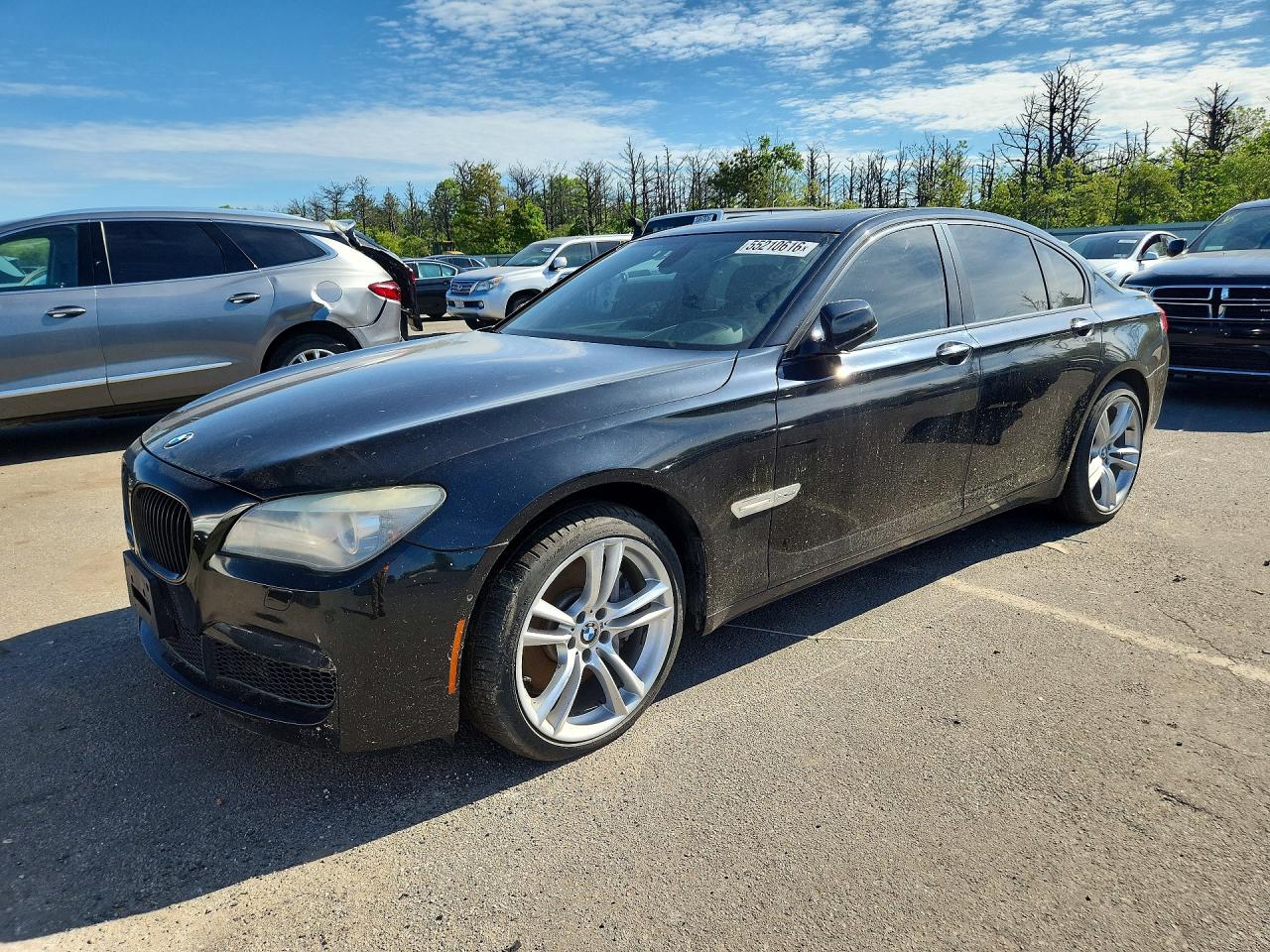 2012 BMW 7 Series 750i xDrive, VIN WBAKC6C55CDX99486 — Minor dents and scratches