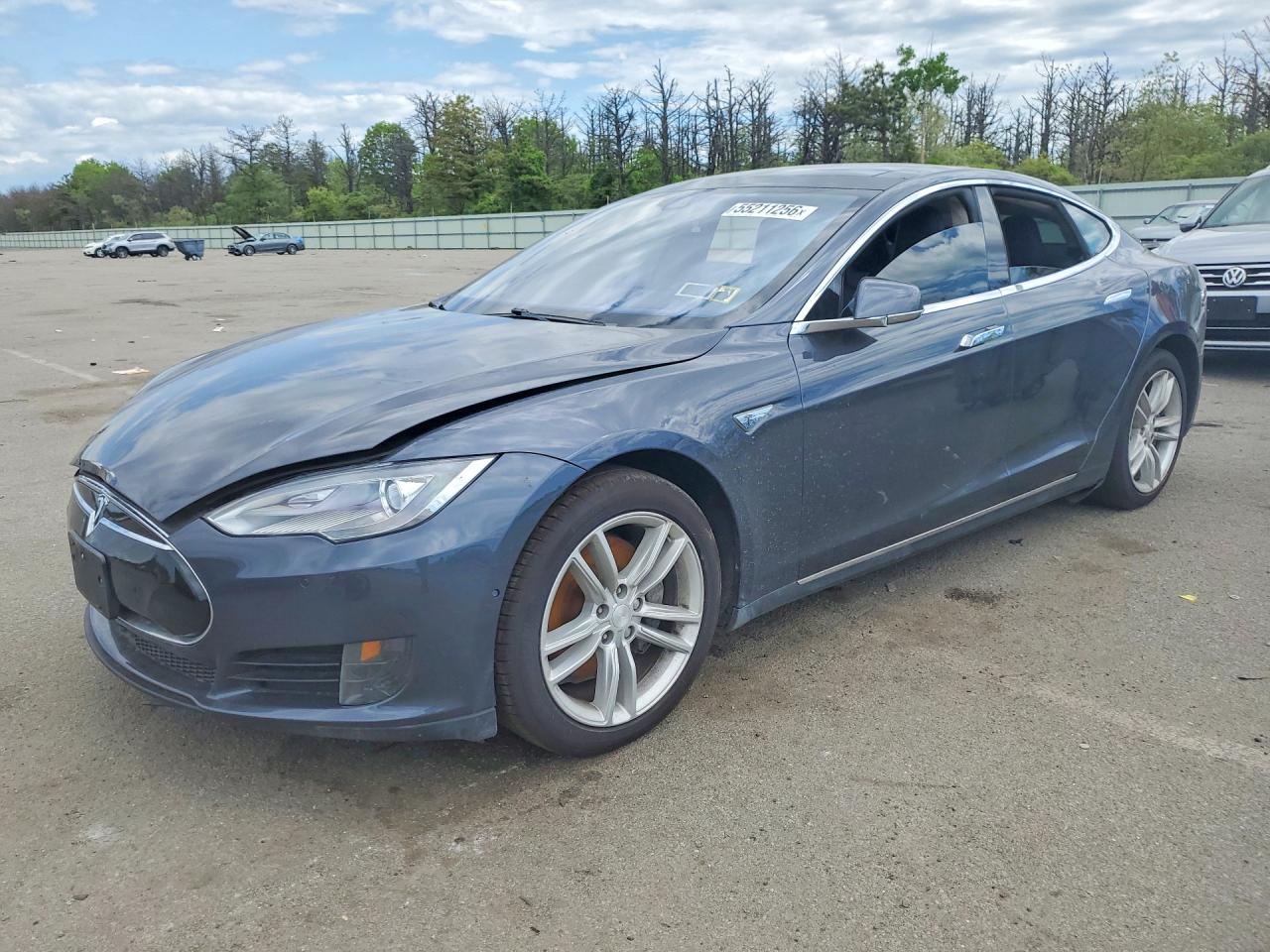 2015 Tesla Model S 85, VIN 5YJSA1E11FF116590 — Water / flood