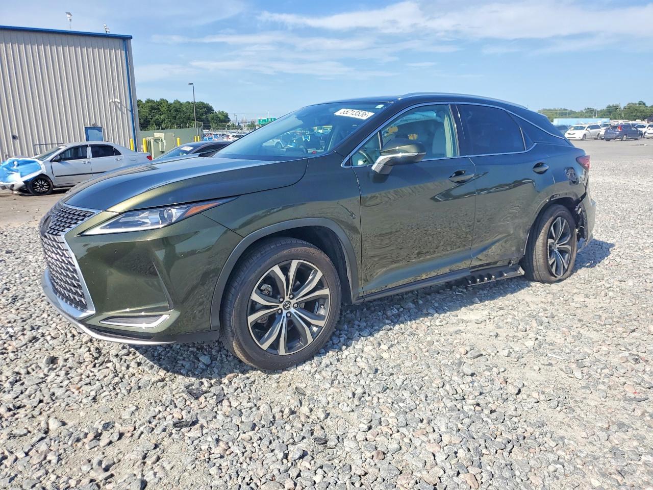 2021 Lexus RX 350, VIN 2T2HZMAA6MC206017 — Бок