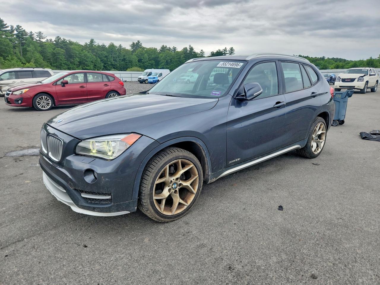 2015 BMW X1 xDrive28i, VIN WBAVL1C56FVY39234 — Minor dents and scratches