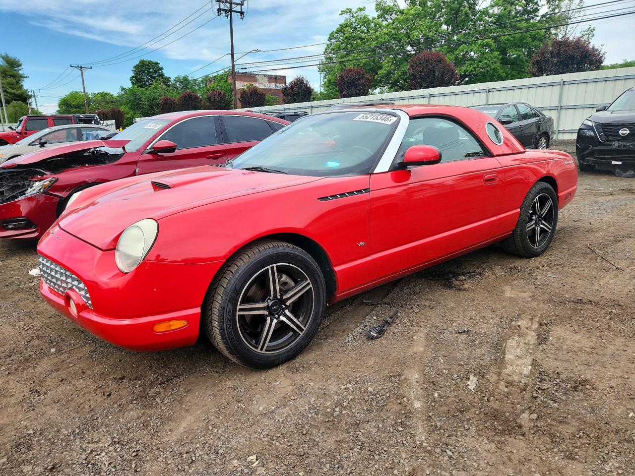 2003 Ford Thunderbird Deluxe, VIN 1FAHP60A13Y104003 — Side