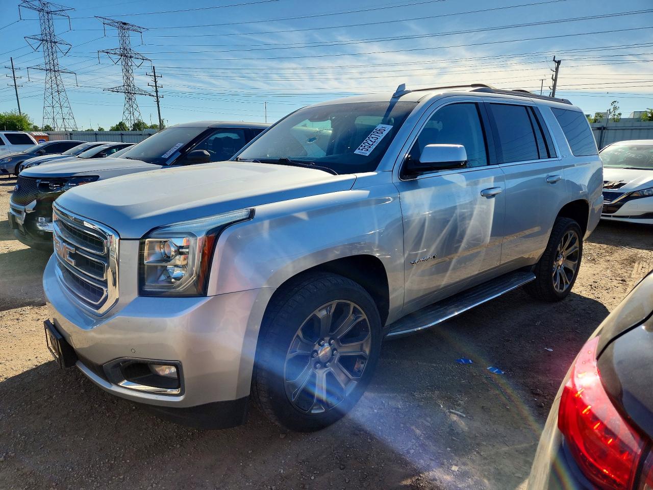 2016 GMC Yukon SLT, VIN 1GKS2BKC7GR276255 — Град