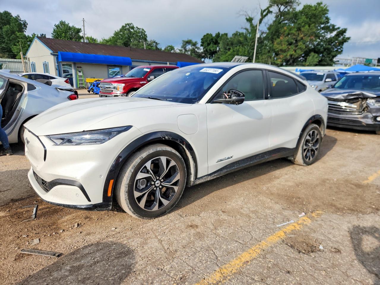 2023 Ford Mustang Mach-E Premium, VIN 3FMTK3SUXPMA56863 — Hail