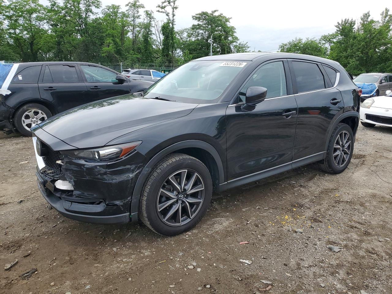 2018 Mazda CX-5 Touring, VIN JM3KFBCM4J0302028 — Front end