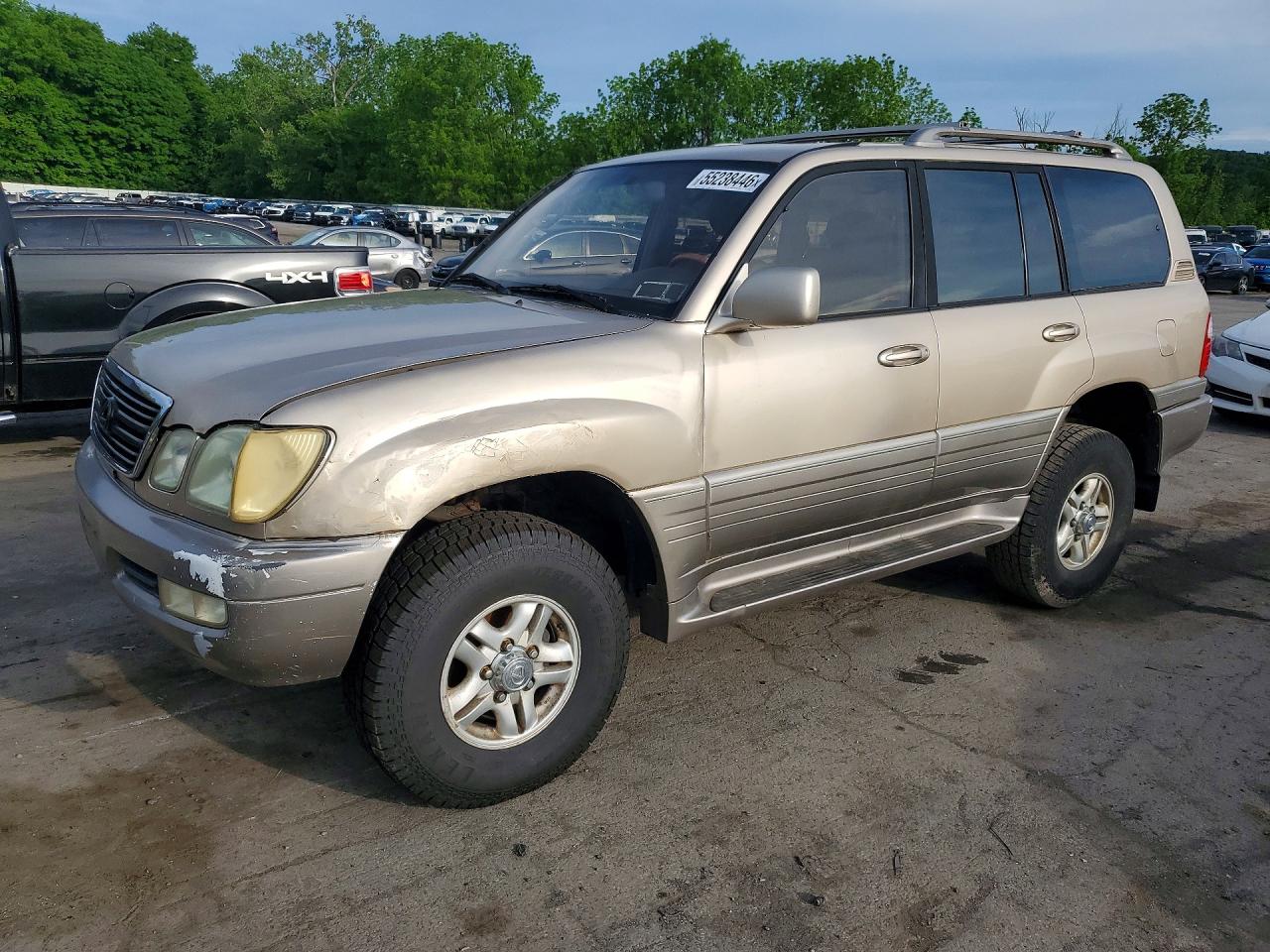2000 Lexus LX 470, VIN JT6HT00W6Y0077859 — Minor dents and scratches