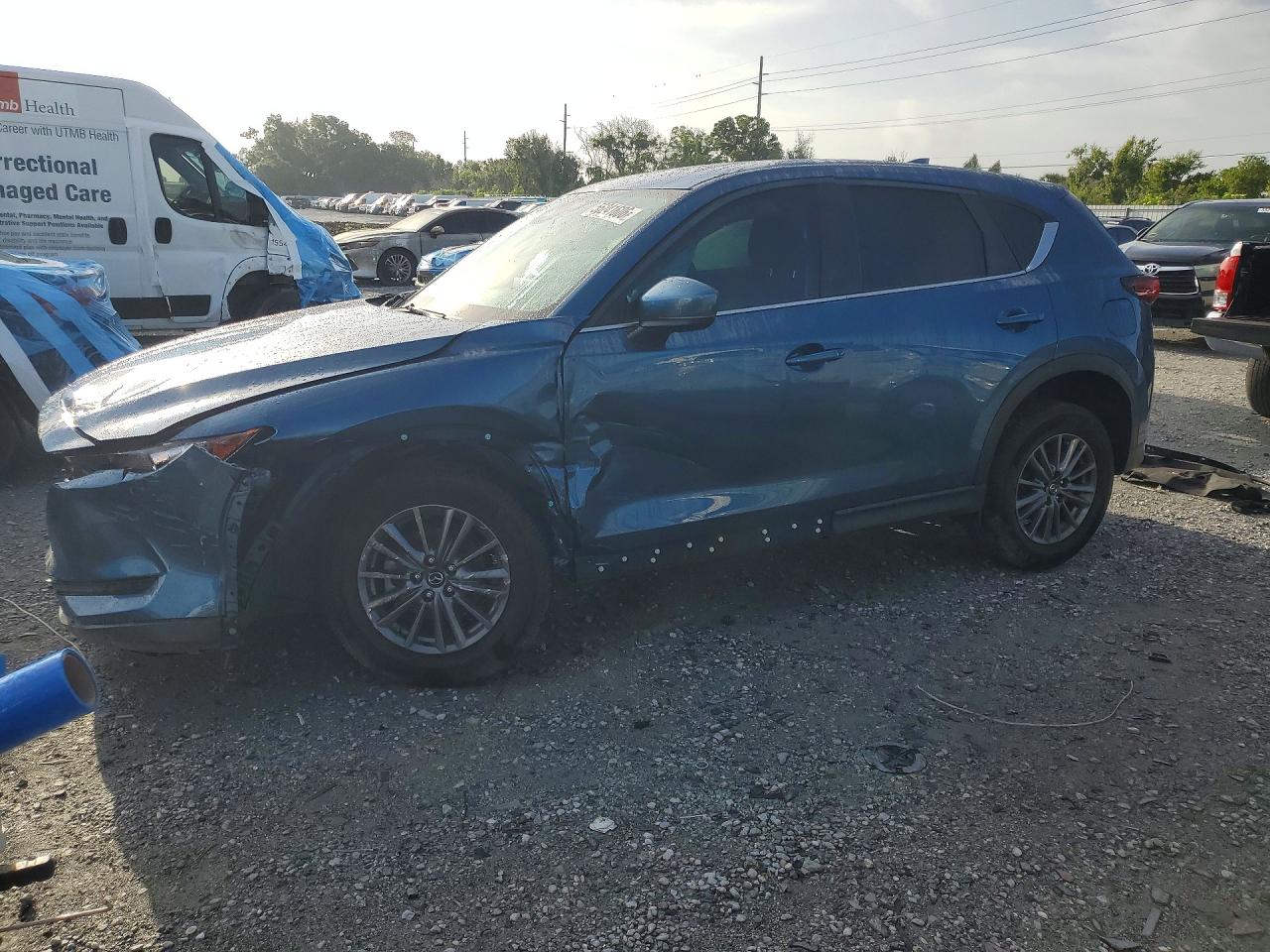 2021 Mazda CX-5 Sport, VIN JM3KFABM7M0354009 — Front end