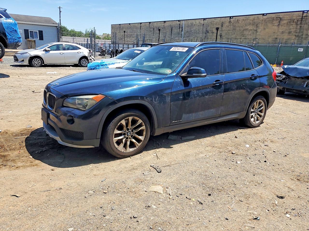2015 BMW X1 xDrive28i, VIN WBAVL1C59FVY28941 — Front end