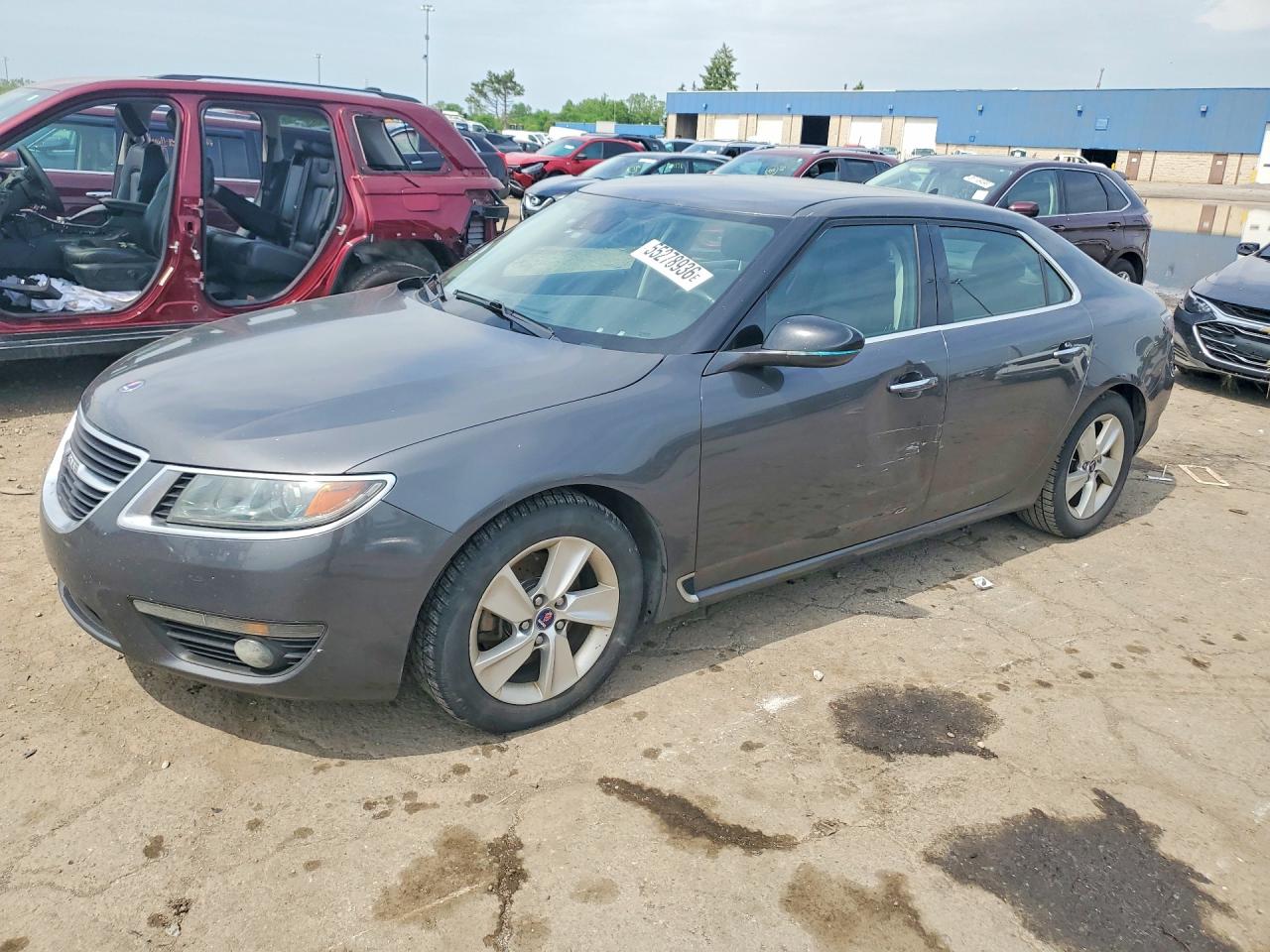 2011 Saab 9-5 Turbo4, VIN YS3GN4AR0B4004526 — Side