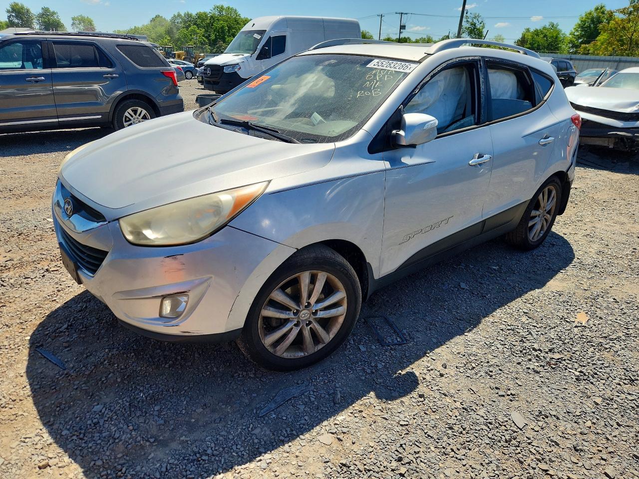 2012 Hyundai Tucson GLS, VIN KM8JUCAC6CU425623 — Side