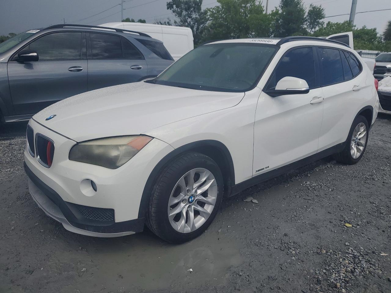2015 BMW X1 xDrive28i, VIN WBAVL1C56FVY28752 — Minor dents and scratches