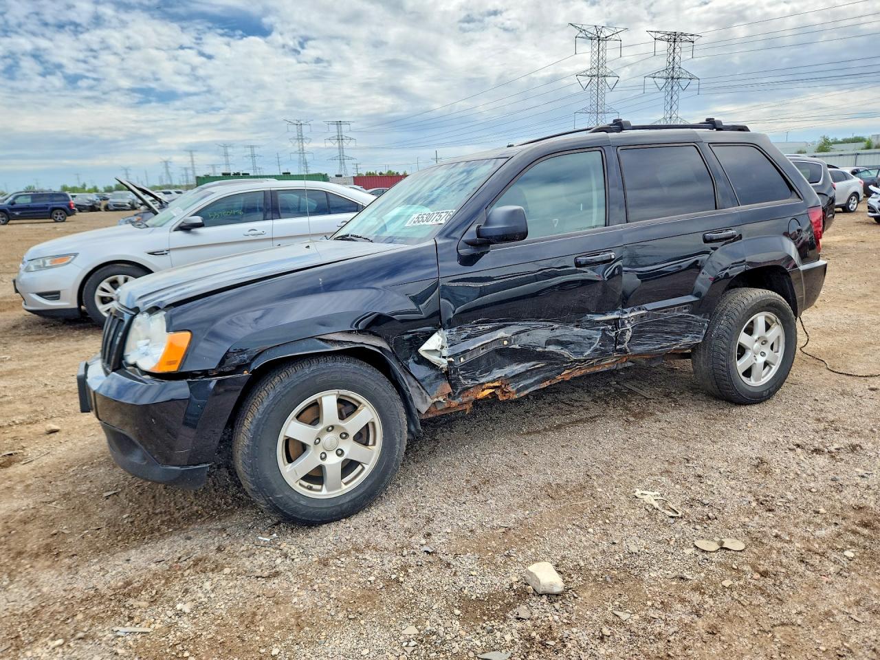 2008 Jeep Grand Cherokee Laredo, VIN 1J8GR48K08C145365 — Side