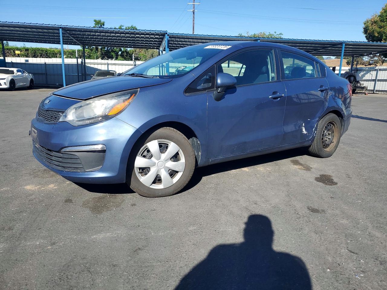 2016 Kia Rio LX, VIN KNADM4A37G6549933 — Side