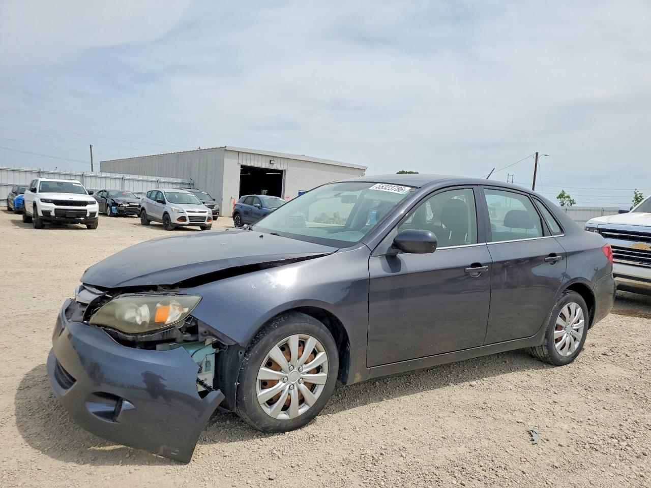 2010 Subaru Impreza i, VIN JF1GE6A6XAH514324 — Front end