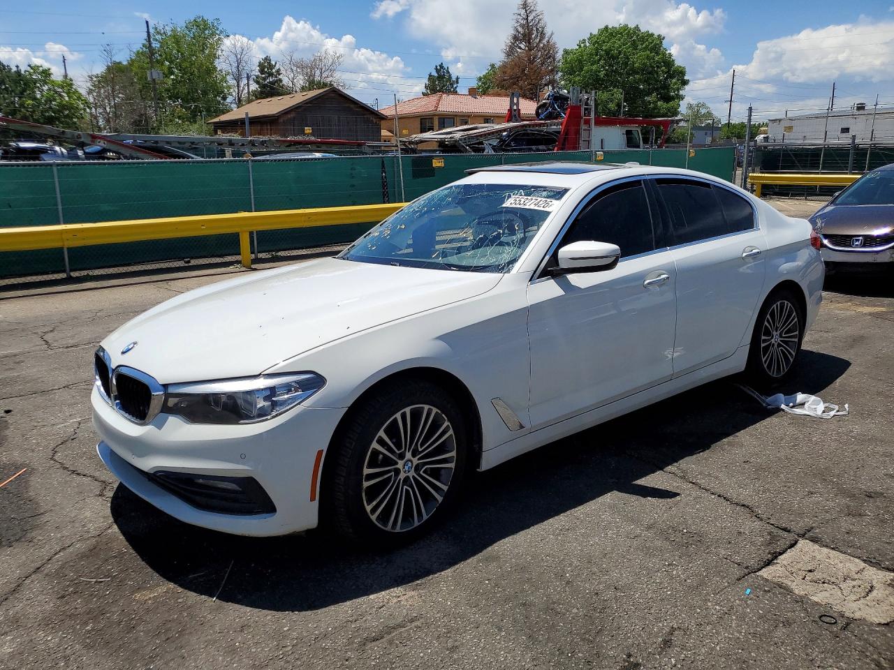 2018 BMW 5 Series 540i xDrive, VIN WBAJE7C56JWC56311 — Side